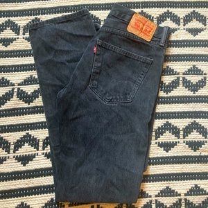 Men’s distressed black Levi 505 jeans